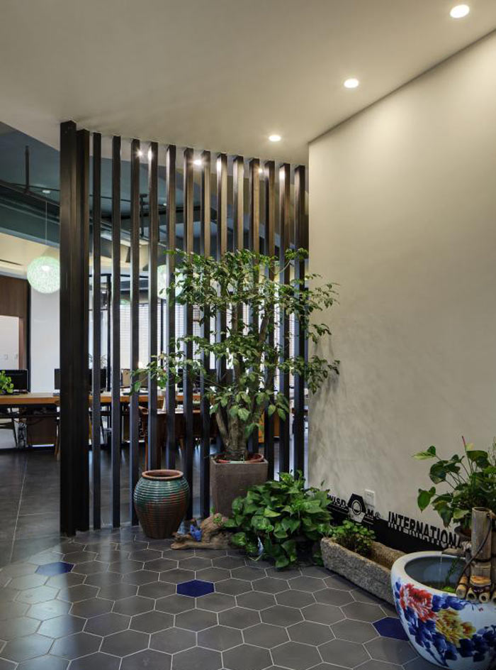 進出口貿(mào)易公司辦公室進門區(qū)裝修設(shè)計效果圖